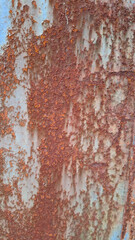 Rust Texture Abstract: An extreme close-up view showcases an old, decaying metal surface covered in vibrant rust patterns. The textured surface creates a sense of time, aging, and weathering.