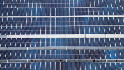 blue solar photovoltaic panel, generating electrical energy in the industrial environment....