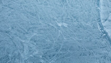 abstract close-up of an ice surface with subtle patterns and textures, hinting at winter sports and frozen landscapes. The image captures the essence of the cold season