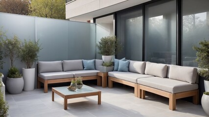 Fototapeta premium A modern outdoor patio area with comfortable seating and plants