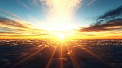 Obraz premium A breathtaking aerial view of a vibrant sunrise or sunset, radiant sun casting golden rays through fluffy clouds against a vibrant sky of blues and oranges