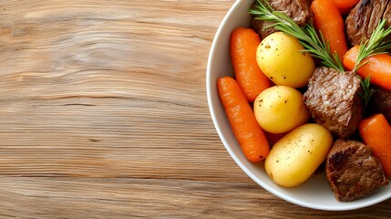 Hearty Beef Stew with Root Vegetables in Bowl on Wood Surface