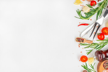 Fototapeta premium composition with ingredients for cooking, Herbs and condiments on light background. Top view, copy space
