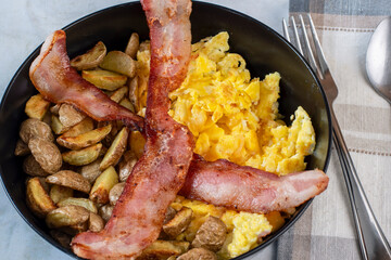  scramble egg served with  home fries and bacon