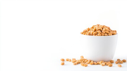 Bowl of roasted peanuts with scattered kernels