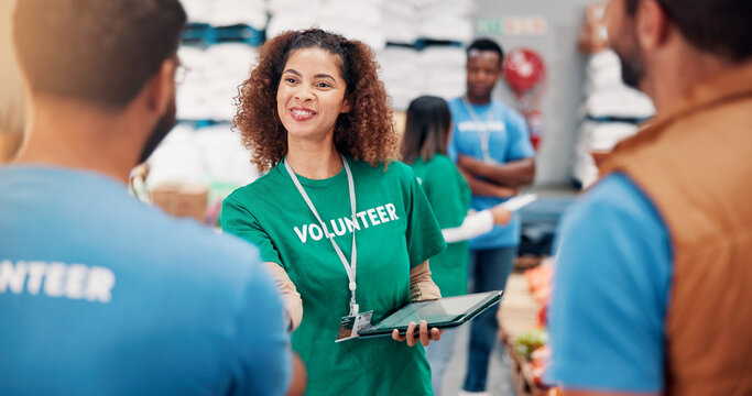Smile, people and volunteer on tablet at warehouse for greeting, donation sign up and charity help. Person, b2b introduction and registration of humanitarian aid, community service and ngo onboarding