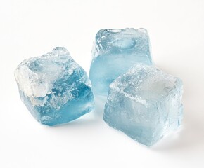 Obraz premium Three Blue Ice Cubes on White Background for Refreshing Drinks