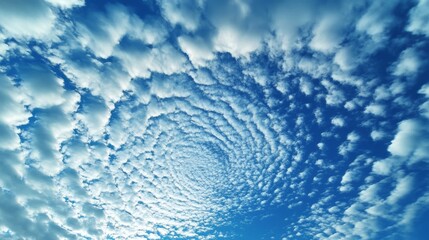 Obraz premium God's eye view of a blue sky with white clouds