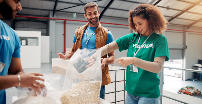 Volunteer, people and packing food for charity with community service, outreach project and donation. NGO organization, teamwork and helping with oats parcel in warehouse for social responsibility