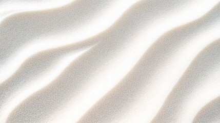 Gentle White Sand Texture with Wave Patterns Under Soft Light