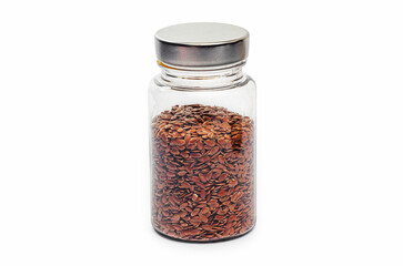 Glass jar filled with flaxseeds and metal cap on white background