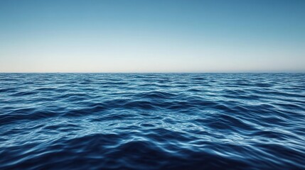 Vast ocean expanse. Calm, deep blue water stretches to horizon