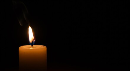 Close-up of a single candle burning gently in a dark space, symbolizing awareness and mindfulness, International Day of Conscience, serene and inspiring vibe 