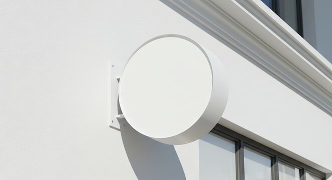 Round mock up sign on white building wall 