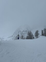 A stunning winter scene from a ski resort in the Italian Alps. Snow-covered slopes, pristine landscapes, and ski lifts make this a perfect destination for skiing and snowboarding enthusiasts.
