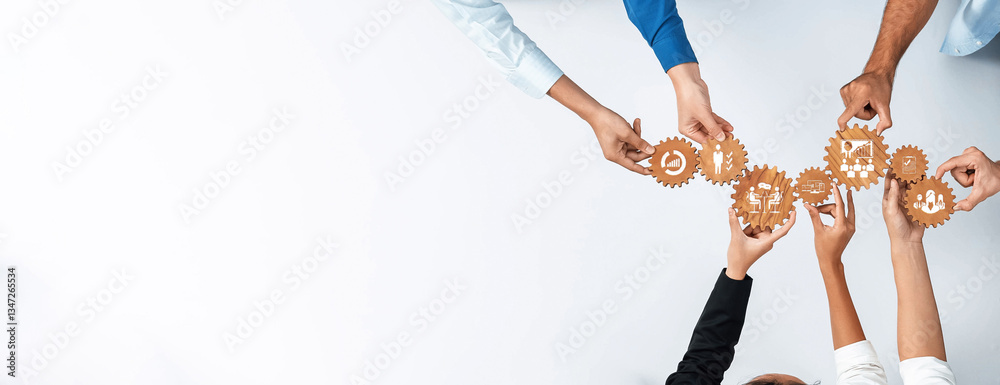 Aufkleber A diverse group of hands actively collaborates to assemble gears, symbolizing teamwork and effective project management in a dynamic business environment. Amity