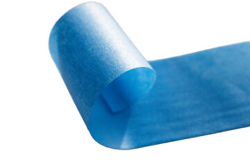 Blue adhesive tape roll isolated on white. Close-up of a blue adhesive tape roll partially unrolled, isolated on a white background. Ideal for medical, crafting, or packaging use.  

