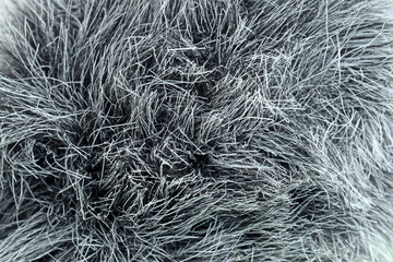 macro of grey fake fur microphone cover