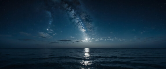 Fototapeta premium A panoramic night sky stretching over the open ocean, with the full moon casting a soft silver glow across the water. The waves gently ripple, reflecting the shimmering starlight.