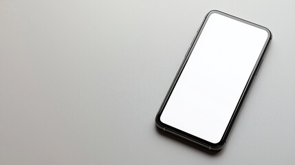 Blank Smartphone Screen on Gray Surface