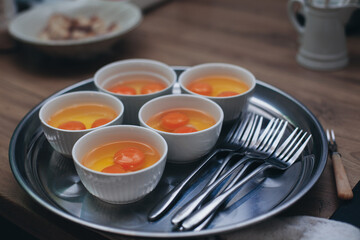 broken eggs in small plates