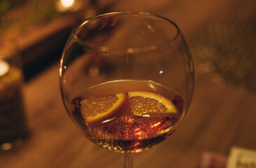glass of prosecco with oranges