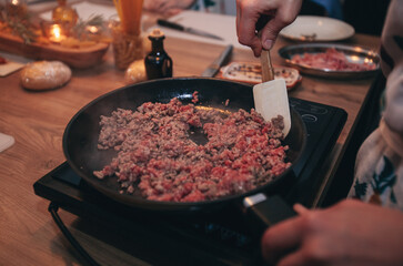 the process of preparing the filling for lasagna