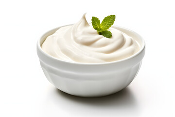 Swirled Mayonnaise in a White Bowl with Basil Garnish
