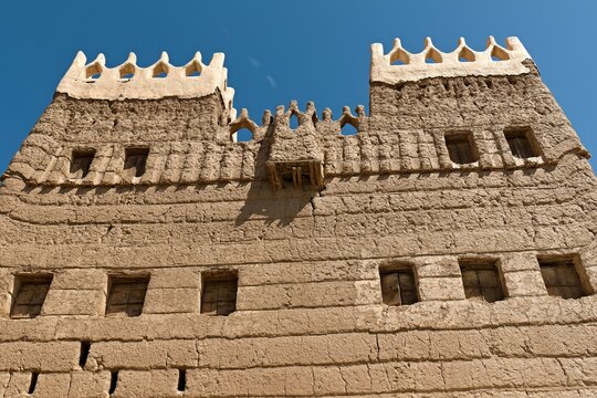 View of the streets of the ancient city of Najran, houses built of mud bricks. Saudi Arabia. Asia.