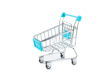 Empty supermarket trolley isolated on white background. Shopping concept. Mockup.
