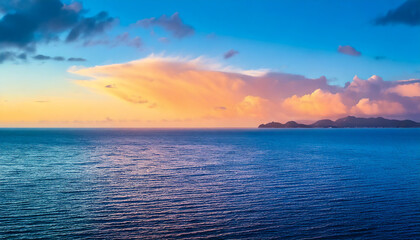 Fototapeta premium Relaxing and calm sea view wallpaper. Open ocean water and sunset sky. 