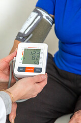 Elderly woman at a doctor appointment. Selective focus.