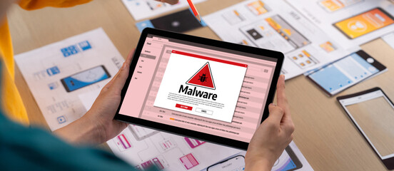 Cyber attacking concept. Malware alert showing on computer screen display scam and threat detection...