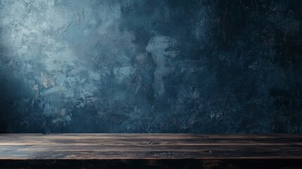 Empty wooden table with dark muted blue wall background