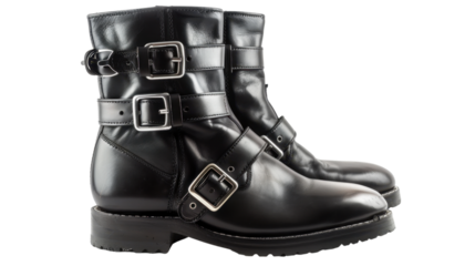 Pair of black leather boots with buckles on transparent background