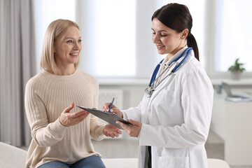 Woman having appointment with doctor in hospital