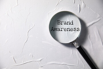 brand awareness text written in a magnifying glass