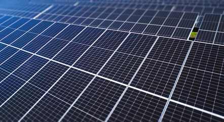Green energy reduce carbon emissions and makes earth cleaner and more ecological.Solar panels park...