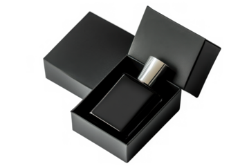 A black perfume bottle with a silver cap inside an open black box on a black background