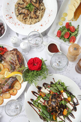 Various Mediterranean dishes served on the restaurant table