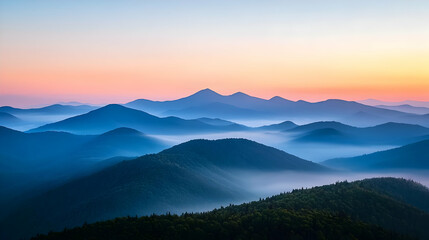 Obraz premium Panoramic Mountain Landscape At Sunset With Blue Haze And Colorful Sky Over Forest Silhouette