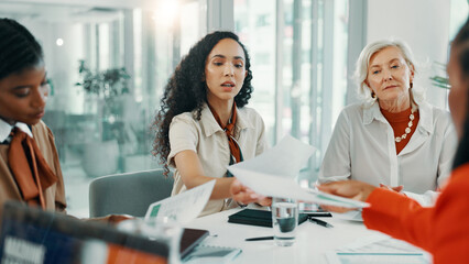 Obraz premium Agenda, documents and meeting with business women in boardroom of office for planning or strategy. Collaboration, proposal and report with employee team in workplace for feedback, review or schedule