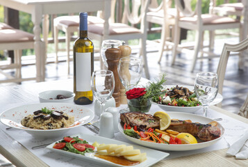 Various Mediterranean dishes served on the restaurant table