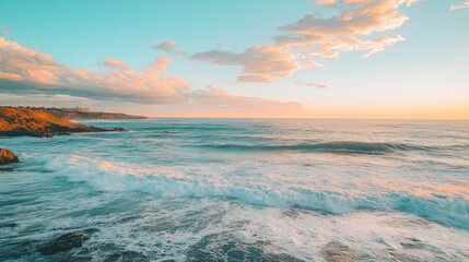 Fototapeta premium Ocean Sunset with Gentle Waves