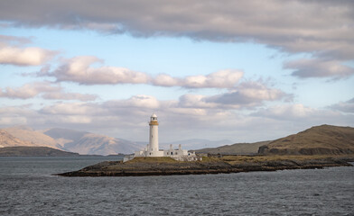 Lismore lighthouse,  built in 1833 by Robert Stevenson near the island of Lismore, Loch Linnhe, Scotland on a beautiful windy and cloudy day
