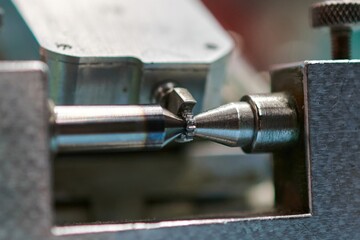 Precision tool measures gear radial runout for accurate machining and quality assurance in a workshop setting