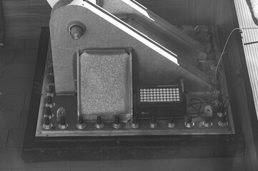 Historic device capturing moments from the past with intricate mechanisms and design situated in a...