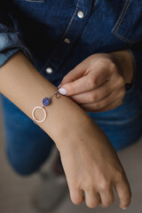 Natural stone bracelet on a woman's hand