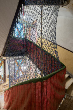 Stairway renovation with netting and safety measures