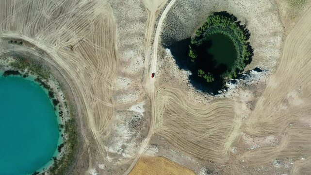 Ağ Lake and Kara Lake stand out as natural wonders hidden in the middle of the steppe. In the rising drone image, the turquoise Ağ Lake, on the other hand, Kara Lake surrounded by dark green trees.
